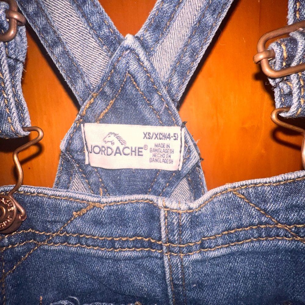 The cutest distressed overalls